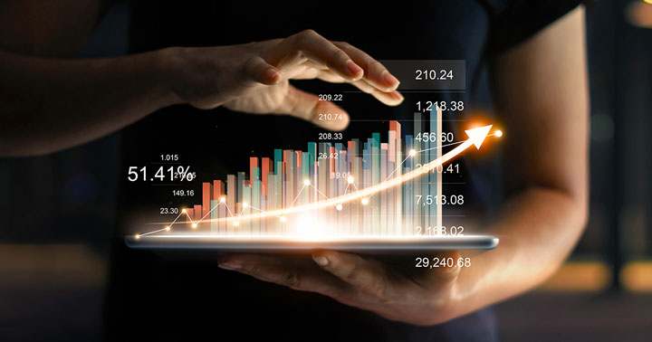 man holding growth graph