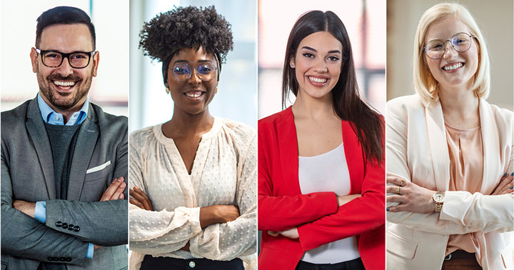 four happy professional people with crossed arms